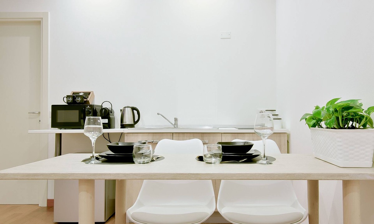 Centro Urbano Apartment | Les Trois Merveilles Grey Lewis