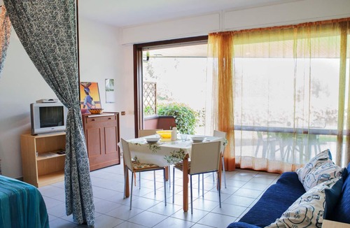Susello Apartment | Attractive studio with terrace and garden, pool and dream view