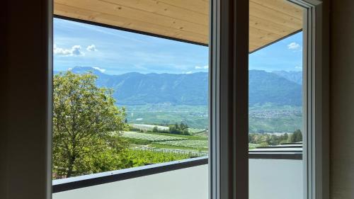 Coredo House | Casa Borghesi - Appartamenti vista lago e Dolomiti