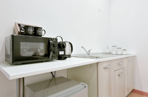 Centro Urbano Apartment | Les Trois Merveilles Grey Lewis