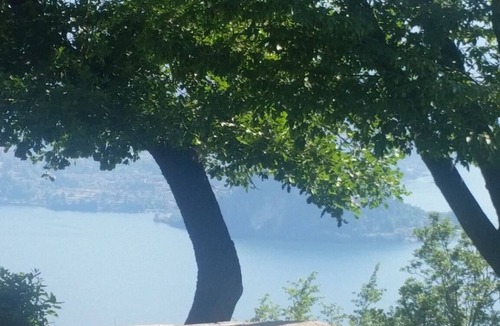 Perledo Villa | Modern Violet House - The villa offers spectacular views of Lake Como