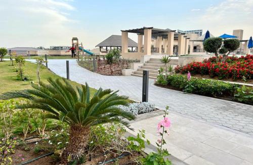 Village Road Apartment | Stylish pool view Studio in Al Dau Height’s 212