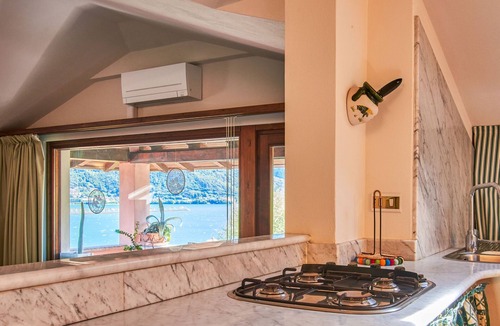 Musso Apartment | Terrazzo fiorito by Interhome