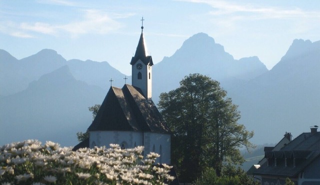 Holiday home in a mountain village with a fantastic mountain backdrop